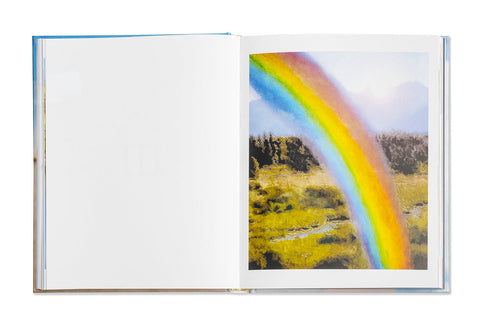 Promise Land photography book by SPBH Editions featuring a cover with a landscape scene and artistic visual design.