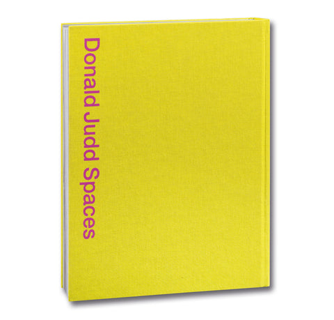 Front cover of the Donald Judd Spaces art book by Judd Foundation, featuring minimalist design and images of Judd's architectural works.
