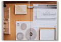Open page of Donald Judd Spaces art book by Judd Foundation, featuring minimalist art and architectural photographs.