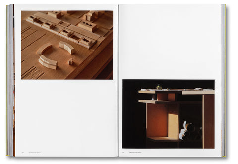 Open art book titled "Donald Judd Spaces" by Judd Foundation showcasing photographs of Judd's minimalist architectural works.
