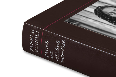 Close-up of the cover of Faces and Phases photography book by MACK, featuring detailed images and artistic design.