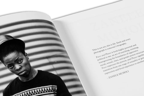 Close-up of the "Faces and Phases" photography book by MACK showing detailed cover art and design.