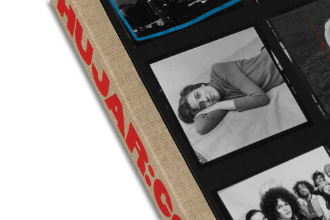 Close-up of pages from "Hujar: Contact" photography book by MACK, showcasing detailed black-and-white photographs and contact sheet layout.