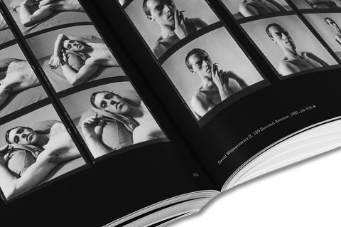 Close-up of a page from Hujar:Contact photography book by MACK, showing detailed black-and-white photographs.
