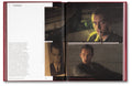 Open pages of "In the Mood?" film book by A24 showcasing vintage movie posters and cinematic artwork.