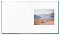 Photograph of the Mountain Black Heart photography book by MACK featuring a dark mountain landscape on the cover.