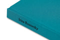 Close-up of the cover of Mountain Black Heart photography book by MACK featuring a dark mountain landscape.