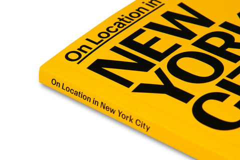 A24 film book titled "On Location in New York City" showing a detailed shot of New York City landmarks and scenes.