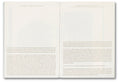 Close-up of the book "Prefigured: Fashion and Exhibition-Making" by SPBH Editions, showing the cover design and title.