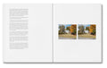 Open photography book titled The Mental Image by MACK, showcasing black and white photographic pages.