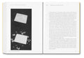 Cover of "Written Down / Written Up" by John Hilliard, a book with a black and white design and the MACK publisher logo.