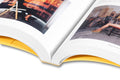 Close-up of the cover of "Written Down / Written Up" by John Hilliard, a book featuring selected writings, published by MACK.