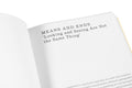 Close-up of the book "Written Down / Written Up: Selected Writings of John Hilliard" by MACK, showing the detailed cover design.